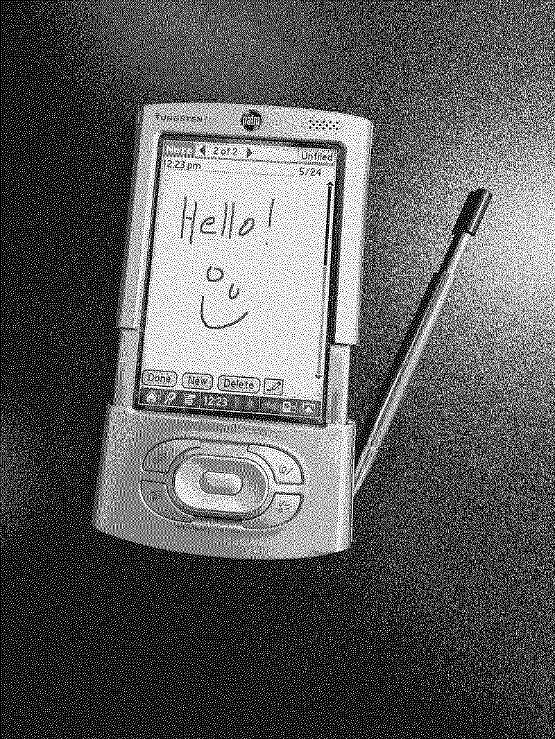 A Palm Pilot Tungsten T3 with Hello and a smiley face written on the screen